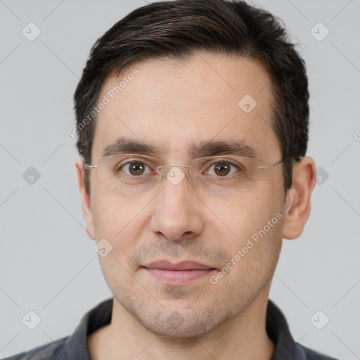 Joyful white adult male with short  brown hair and brown eyes