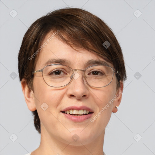 Joyful white adult female with short  brown hair and brown eyes