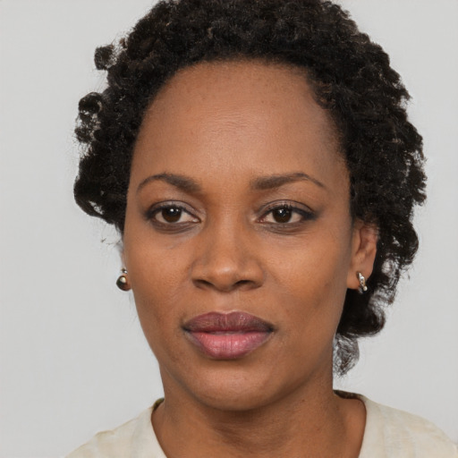 Neutral black adult female with short  black hair and brown eyes