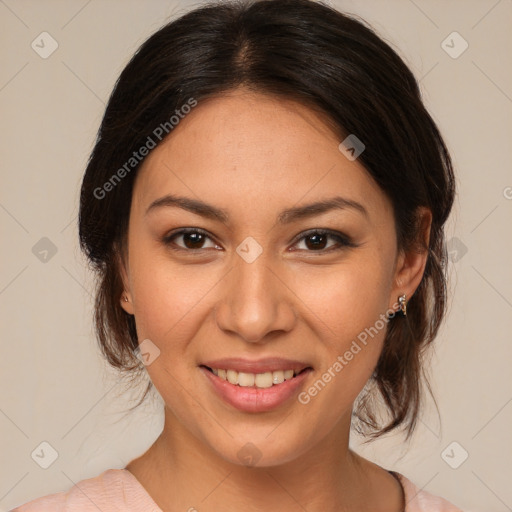 Joyful latino young-adult female with medium  brown hair and brown eyes