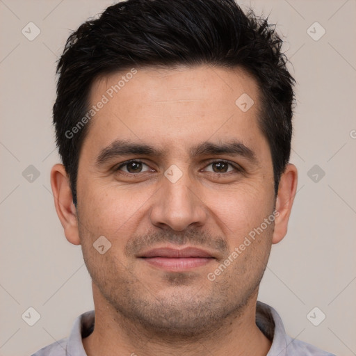 Joyful white young-adult male with short  black hair and brown eyes