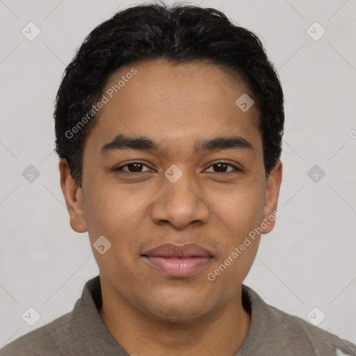Joyful latino young-adult male with short  black hair and brown eyes