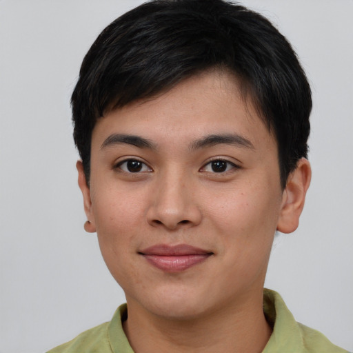 Joyful asian young-adult female with short  brown hair and brown eyes