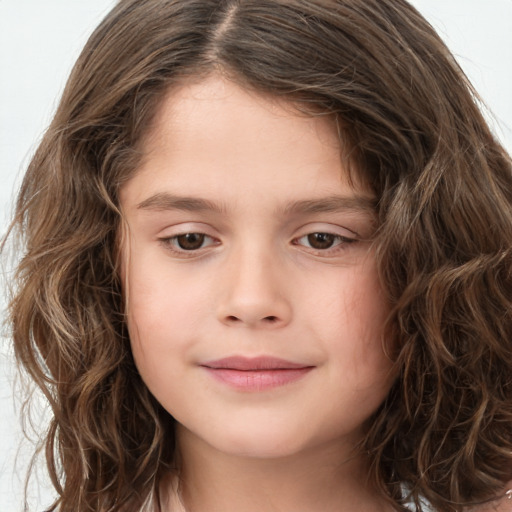 Joyful white child female with long  brown hair and brown eyes