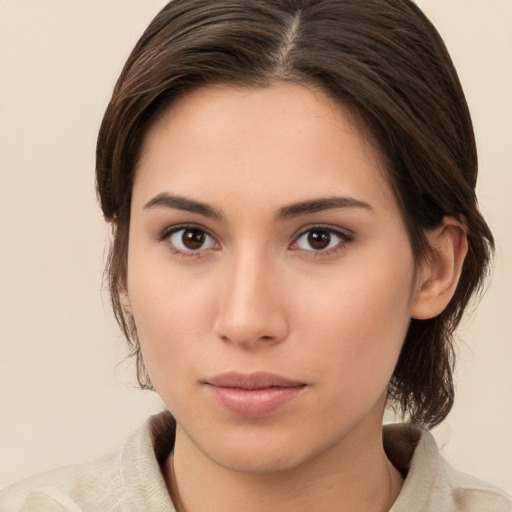 Neutral white young-adult female with medium  brown hair and brown eyes