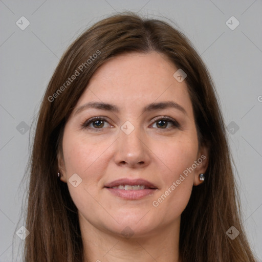 Joyful white young-adult female with long  brown hair and grey eyes