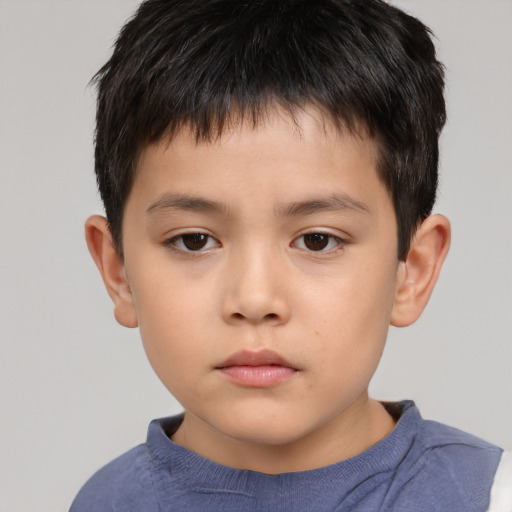 Neutral asian child male with short  brown hair and brown eyes