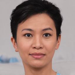 Joyful asian young-adult female with short  brown hair and brown eyes