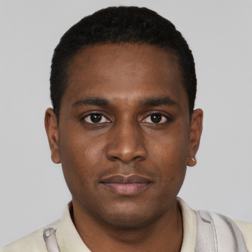 Neutral black young-adult male with short  black hair and brown eyes