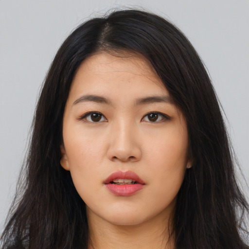 Neutral asian young-adult female with long  black hair and brown eyes