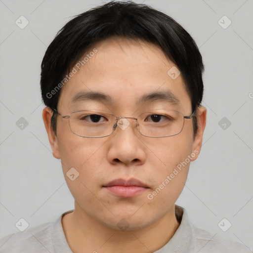 Neutral asian young-adult male with short  brown hair and brown eyes