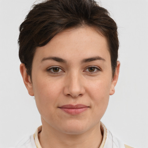 Joyful white young-adult female with short  brown hair and brown eyes