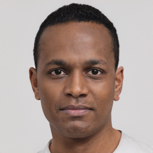 Neutral black young-adult male with short  black hair and brown eyes