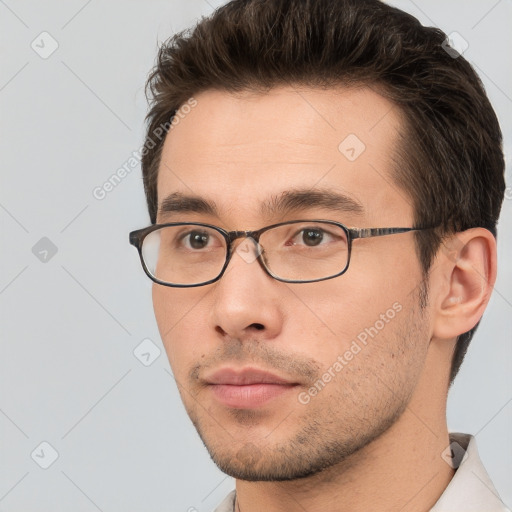 Neutral white young-adult male with short  brown hair and brown eyes