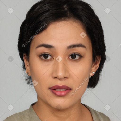 Joyful latino young-adult female with medium  brown hair and brown eyes