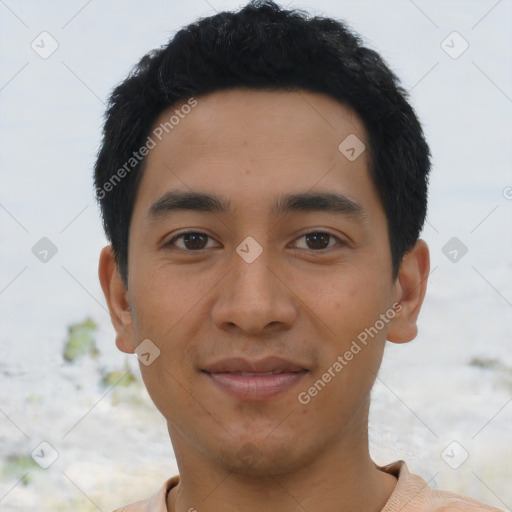 Joyful asian young-adult male with short  black hair and brown eyes