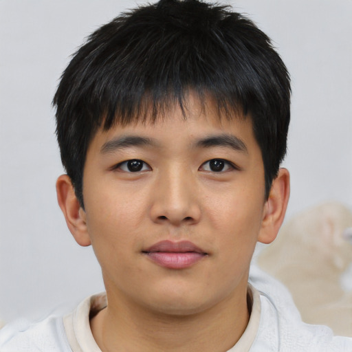 Neutral asian child male with short  brown hair and brown eyes