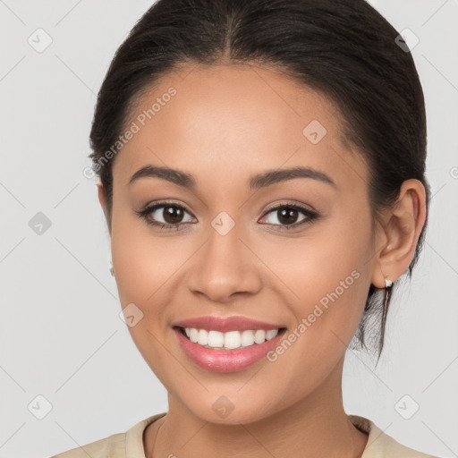 Joyful white young-adult female with long  brown hair and brown eyes