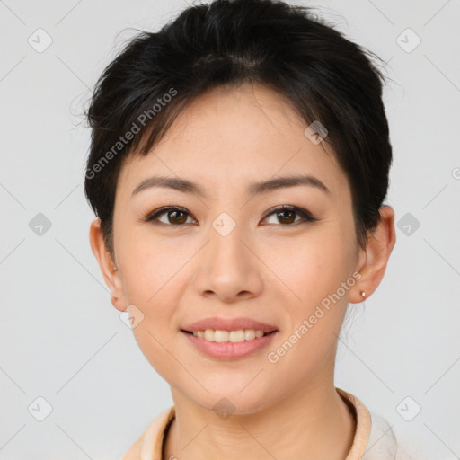 Joyful asian young-adult female with short  brown hair and brown eyes