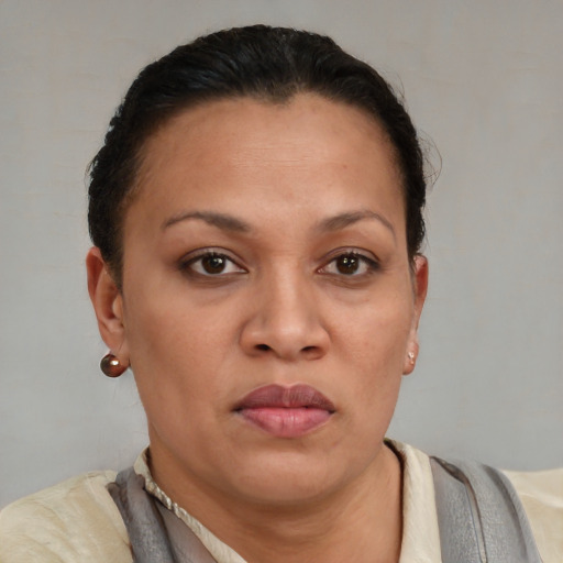 Neutral latino young-adult female with short  brown hair and brown eyes