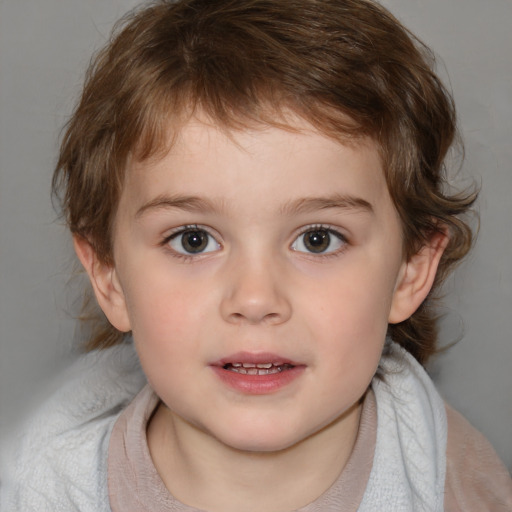 Joyful white child male with medium  brown hair and blue eyes