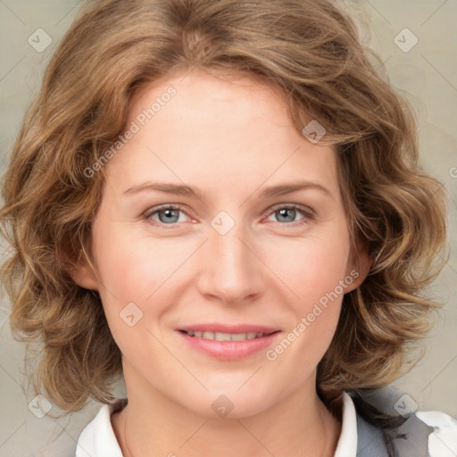 Joyful white young-adult female with medium  brown hair and blue eyes