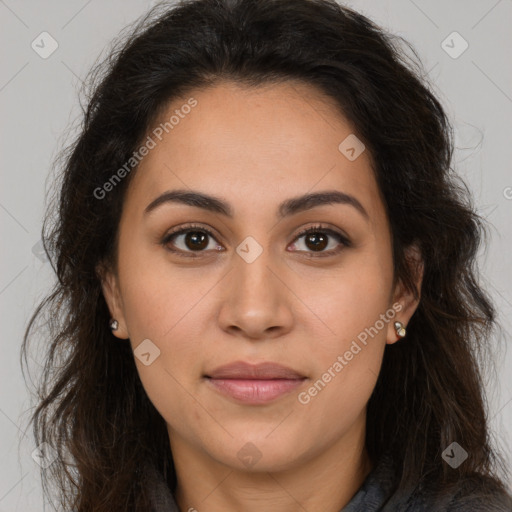 Joyful latino young-adult female with long  brown hair and brown eyes