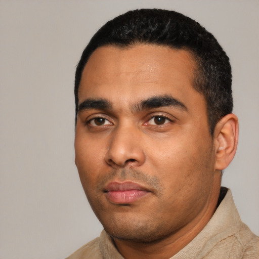 Neutral latino young-adult male with short  black hair and brown eyes