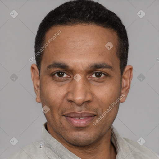 Joyful latino adult male with short  black hair and brown eyes