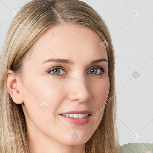 Joyful white young-adult female with long  brown hair and blue eyes