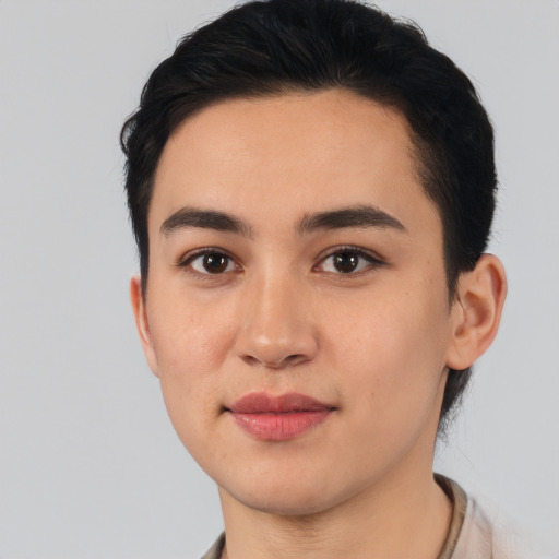 Joyful latino young-adult female with short  black hair and brown eyes