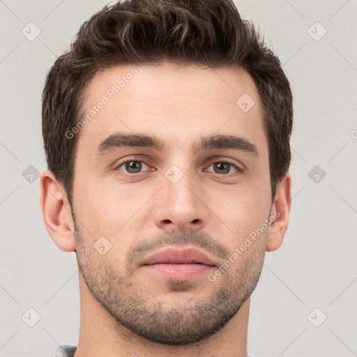 Neutral white young-adult male with short  brown hair and brown eyes