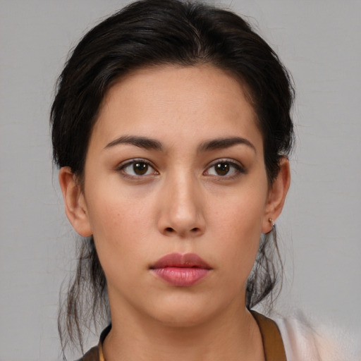 Neutral white young-adult female with medium  brown hair and brown eyes