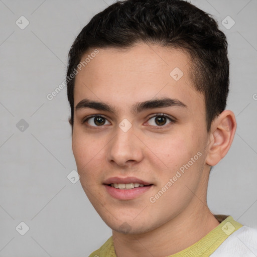 Joyful white young-adult male with short  brown hair and brown eyes