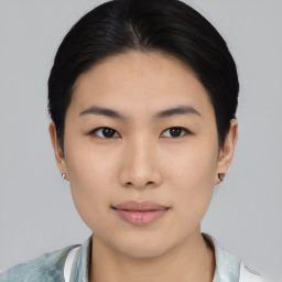 Neutral asian young-adult female with short  black hair and brown eyes