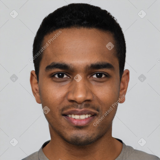 Joyful black young-adult male with short  black hair and brown eyes