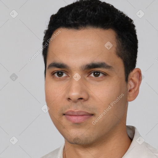 Neutral latino young-adult male with short  black hair and brown eyes