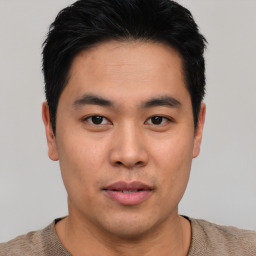 Neutral asian young-adult male with short  black hair and brown eyes