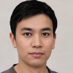 Neutral asian young-adult male with short  brown hair and brown eyes