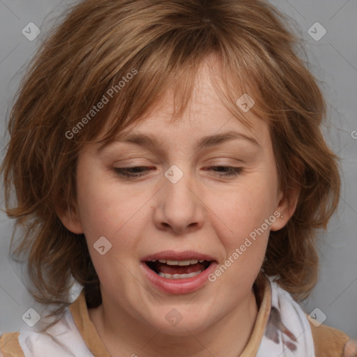 Joyful white adult female with medium  brown hair and brown eyes