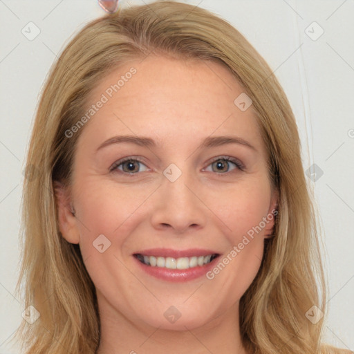 Joyful white young-adult female with long  brown hair and blue eyes