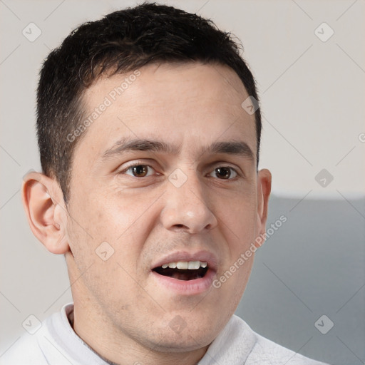 Joyful white adult male with short  brown hair and brown eyes