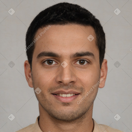 Joyful white young-adult male with short  black hair and brown eyes