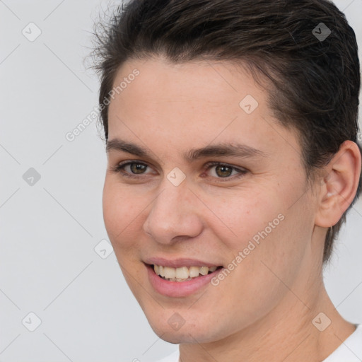 Joyful white young-adult female with short  brown hair and brown eyes