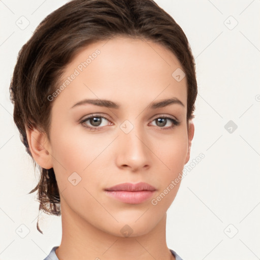 Neutral white young-adult female with short  brown hair and brown eyes