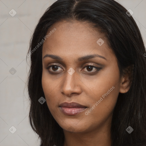 Joyful asian young-adult female with long  brown hair and brown eyes