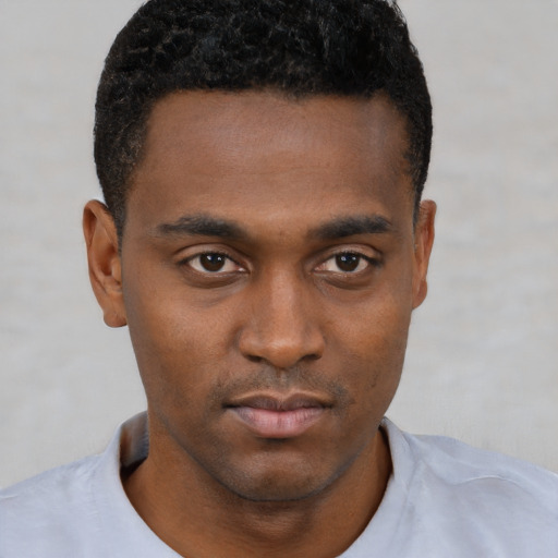 Neutral black young-adult male with short  brown hair and brown eyes