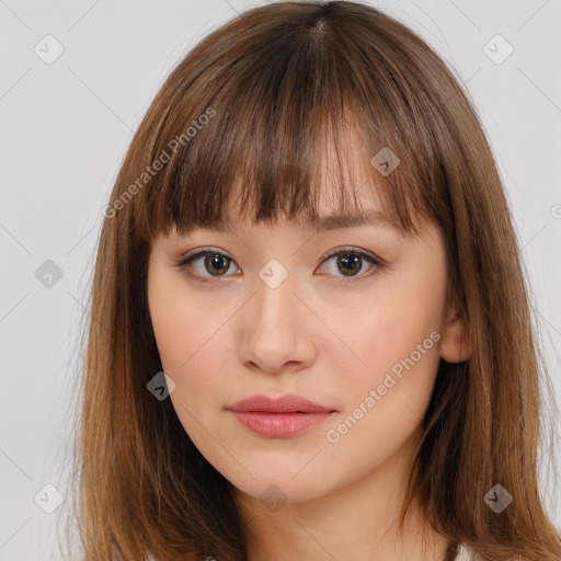 Neutral white young-adult female with long  brown hair and brown eyes