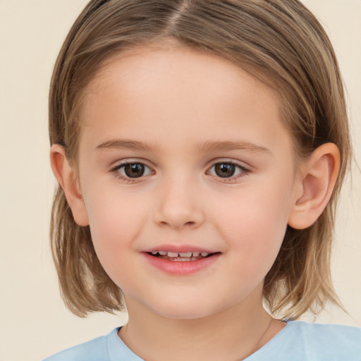 Joyful white child female with medium  brown hair and brown eyes