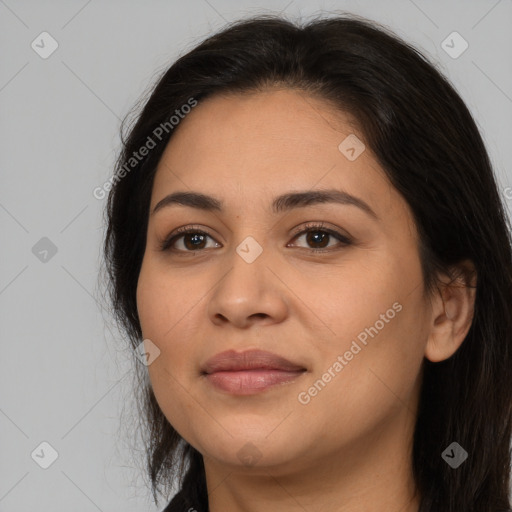 Joyful latino young-adult female with long  brown hair and brown eyes